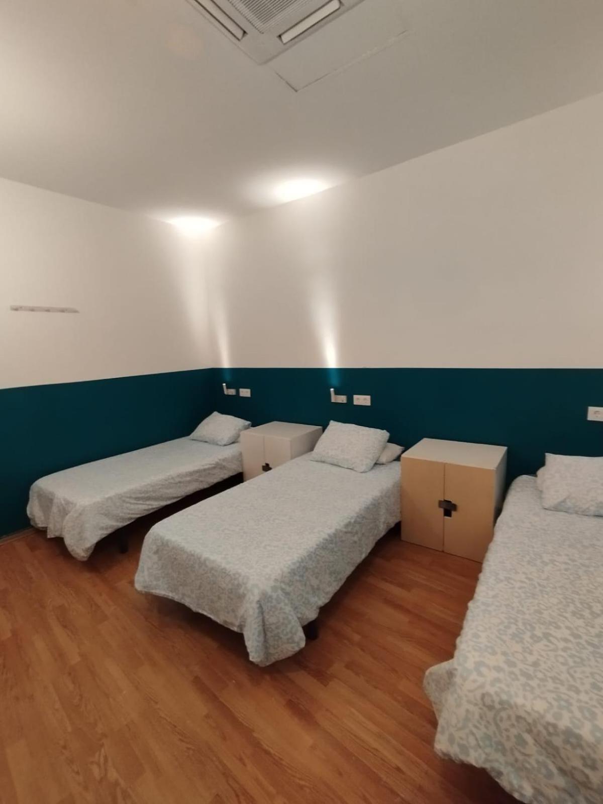 Cama en habitación mixta compartida de 5 camas