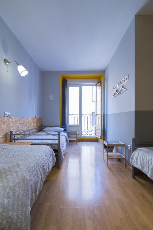 Cama en habitación compartida mixta de 3 camas